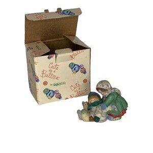 Walking In a Winter Buttonland Mom with Boy Ice Skater Figurine Winter